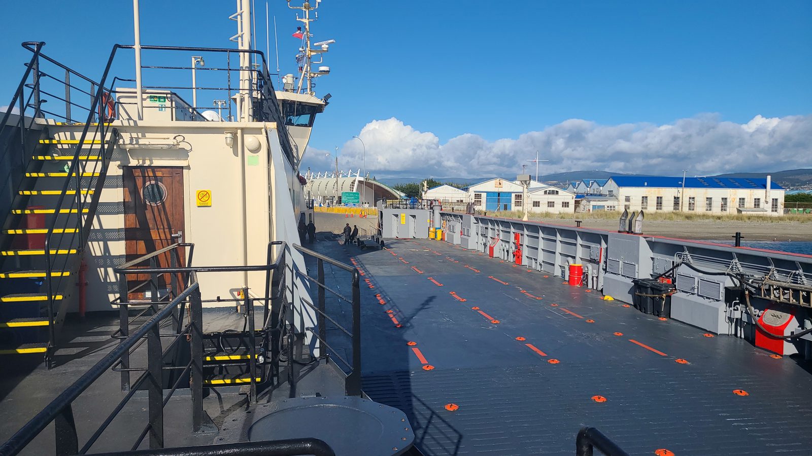 Vehicle ferry deck in Punta Arenas before departing across the Strait of Magellan towards Isla Magdalena.