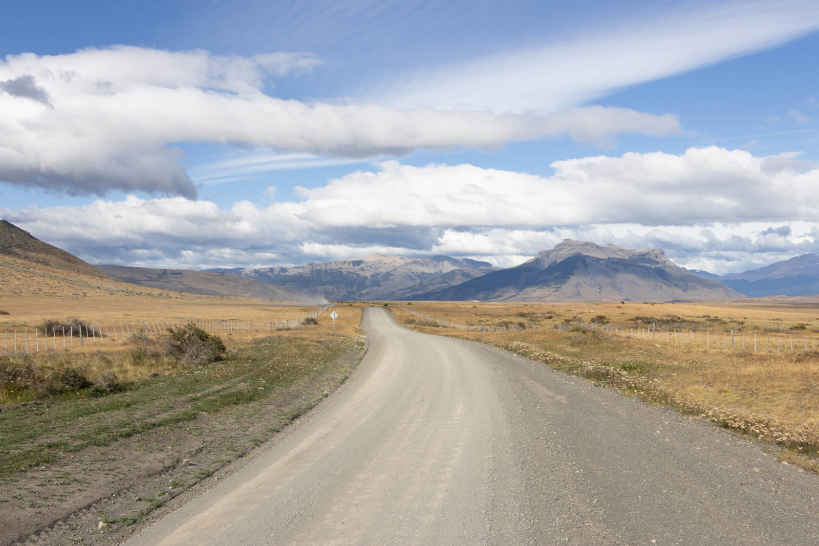 Gravel road crossing the Patagonian steppe along Ruta Y-200 between Cerro Castillo and Puerto Natales.