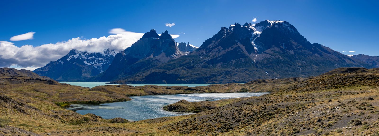 View from the Mirador Lago Toro Trail across turquoise lakes and the Paine Massif in Torres del Paine National Park, Chile.