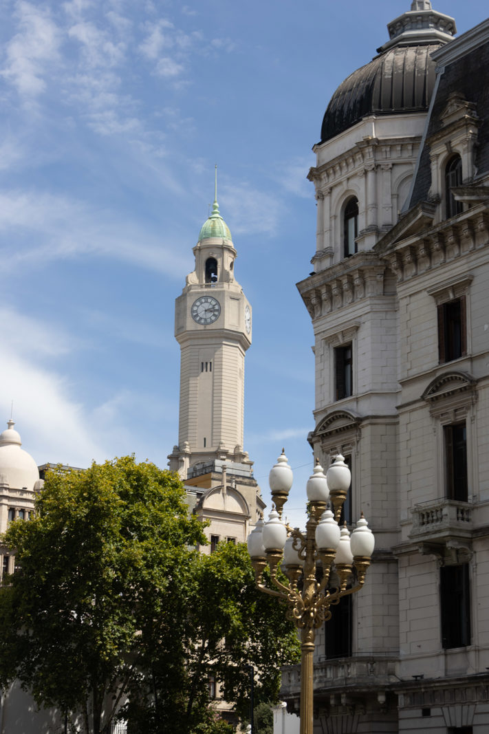Buenos Aires city buildings and clock tower beside Plaza de Mayo.