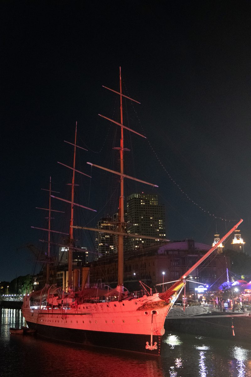 ARA Presidente Sarmiento illuminated at night in Puerto Madero, Buenos Aires.