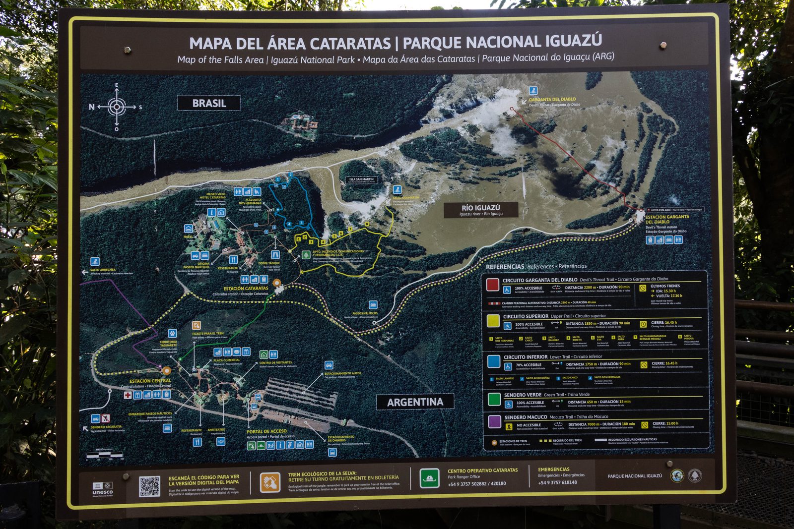 Visitor information map of Iguazú National Park in Argentina showing the ecological train, Devil's Throat, and the Upper and Lower Circuit walking trails.
