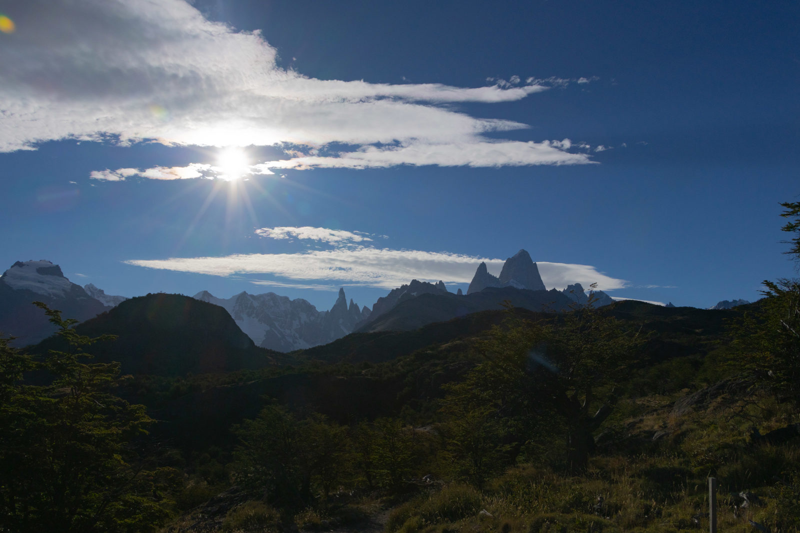 Late afternoon sunlight over the Cerro Torre Massif and Fitz Roy skyline seen from the Mirador Cerro Torre trail near El Chaltén, Patagonia, Argentina.